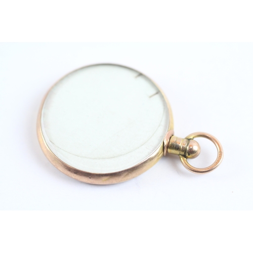 38 - 9ct gold picture locket (4.4g)