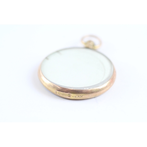 38 - 9ct gold picture locket (4.4g)