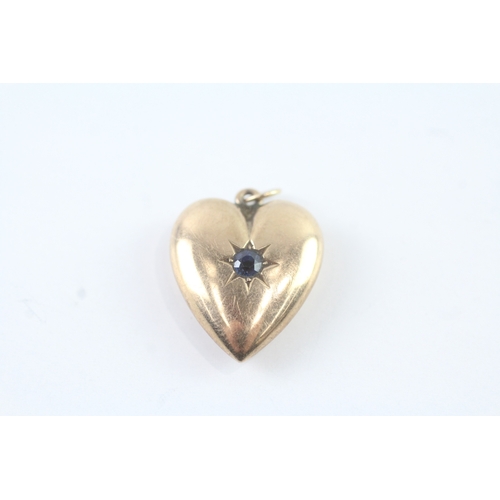 46 - 9ct gold sapphire star set heart locket (2.6g)