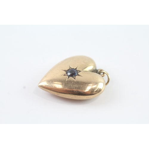 46 - 9ct gold sapphire star set heart locket (2.6g)