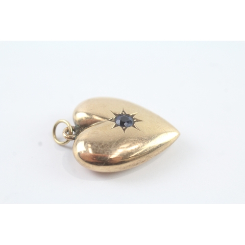 46 - 9ct gold sapphire star set heart locket (2.6g)