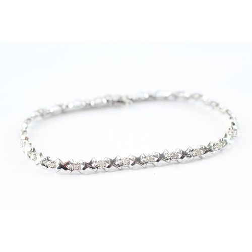 5 - 9ct white gold diamond tennis bracelet (6.3g)