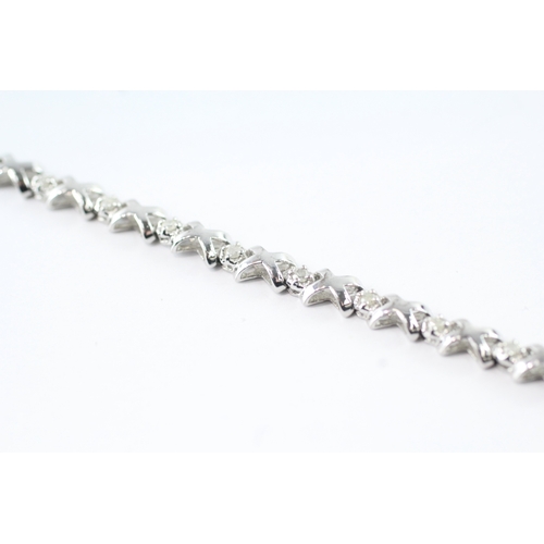 5 - 9ct white gold diamond tennis bracelet (6.3g)