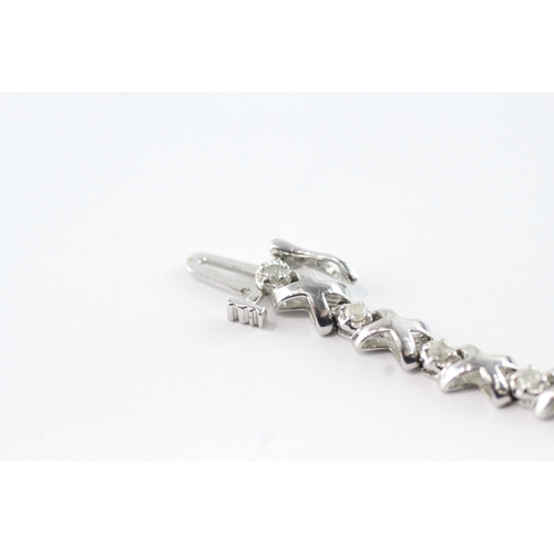 5 - 9ct white gold diamond tennis bracelet (6.3g)