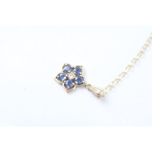 55 - 9ct gold diamond and sapphire set floral cluster pendant necklace (1.6g)