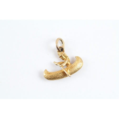 65 - 9ct gold canoe boat charm (1.3g)