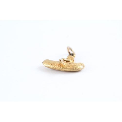 65 - 9ct gold canoe boat charm (1.3g)