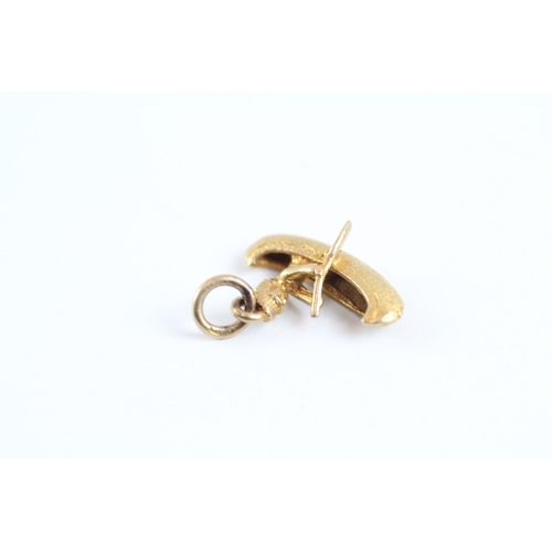 65 - 9ct gold canoe boat charm (1.3g)