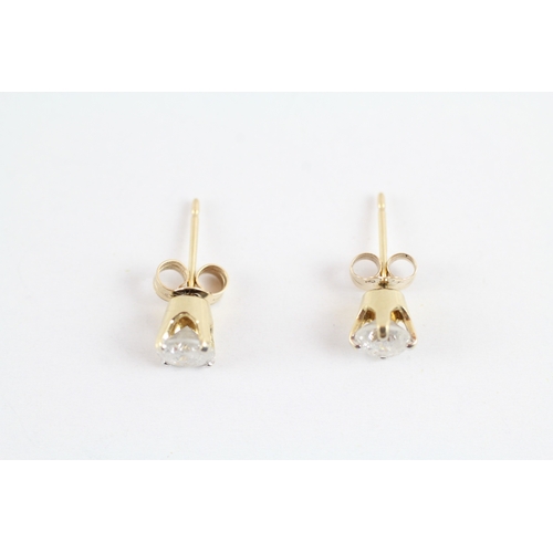 79 - 9ct gold diamond stud earrings (0.7g)