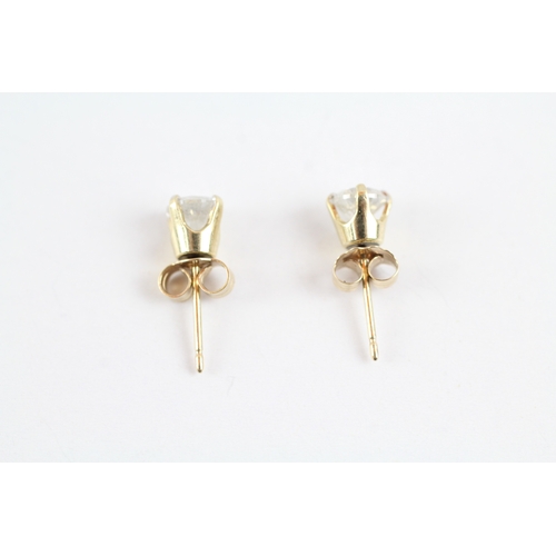 79 - 9ct gold diamond stud earrings (0.7g)