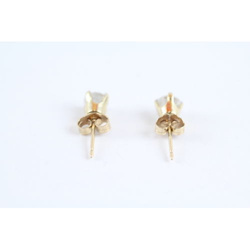 79 - 9ct gold diamond stud earrings (0.7g)