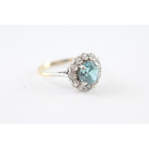 93 - 9ct white gold blue zircon & white gemstone dress ring (3g) Size P