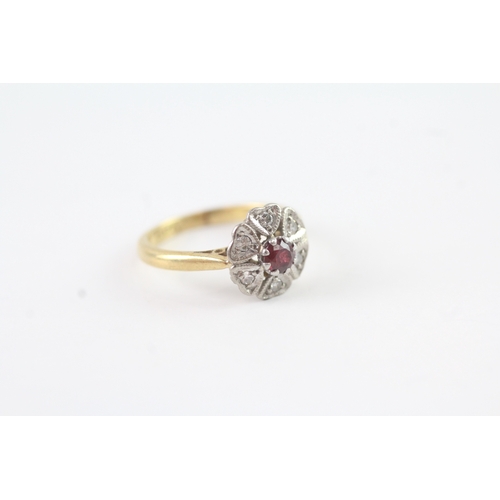 101 - 18ct gold diamond and ruby cluster ring (2.3g) Size G