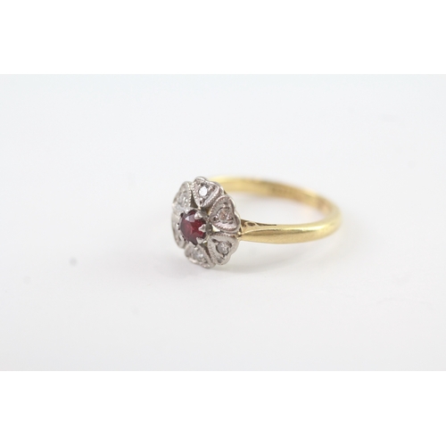 101 - 18ct gold diamond and ruby cluster ring (2.3g) Size G