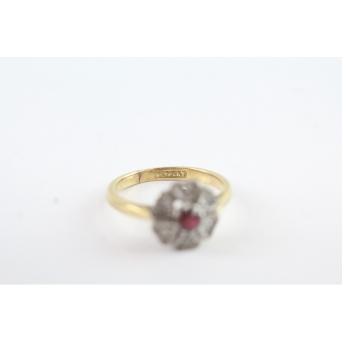 101 - 18ct gold diamond and ruby cluster ring (2.3g) Size G