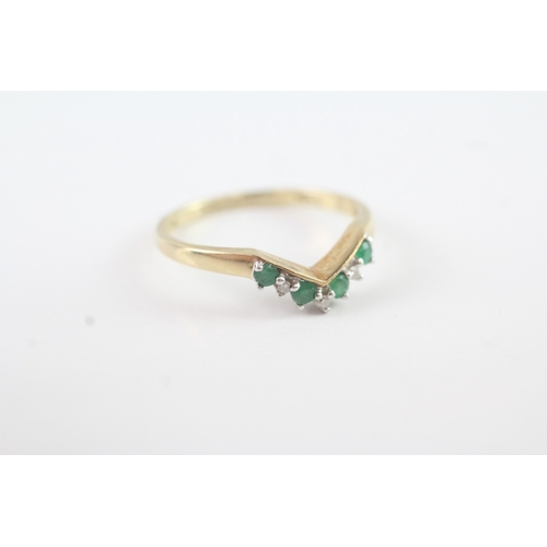 112 - 9ct gold diamond and emerald wish bone ring (1.6g) Size N 1/2