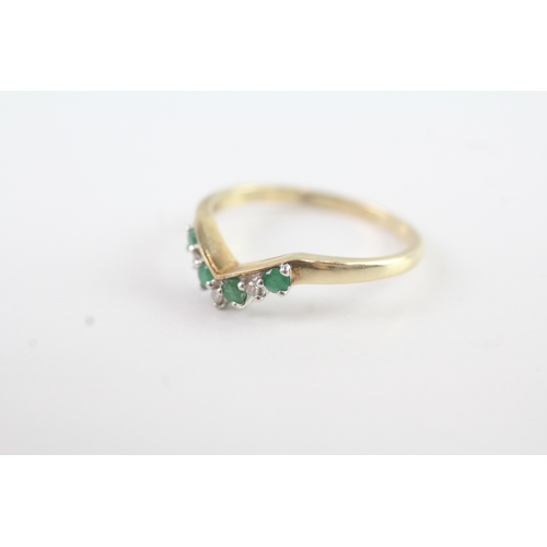 112 - 9ct gold diamond and emerald wish bone ring (1.6g) Size N 1/2