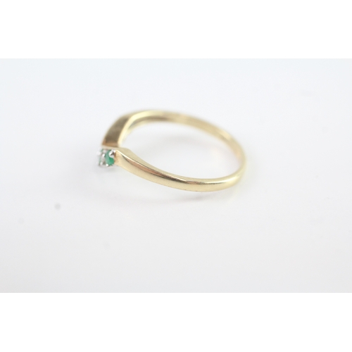 112 - 9ct gold diamond and emerald wish bone ring (1.6g) Size N 1/2