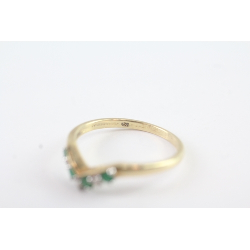 112 - 9ct gold diamond and emerald wish bone ring (1.6g) Size N 1/2