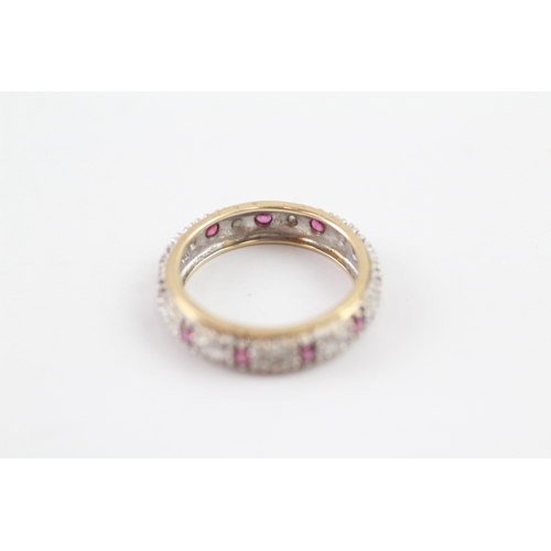 115 - 9ct gold diamond & ruby full eternity ring (2.7g) Size M