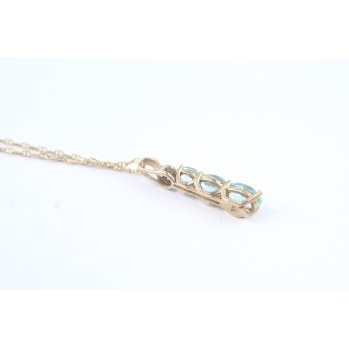 117 - 9ct gold diamond and blue gemstone set pendant necklace (2g)