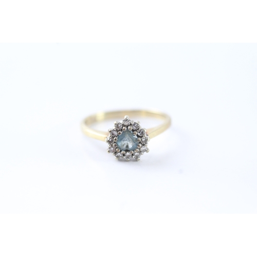 118 - 9ct gold diamond halo & blue gemstone dress ring (2.4g) Size N 1/2