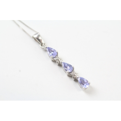 131 - 9ct white gold diamond and tanzanite set pendant necklace (1.7g)