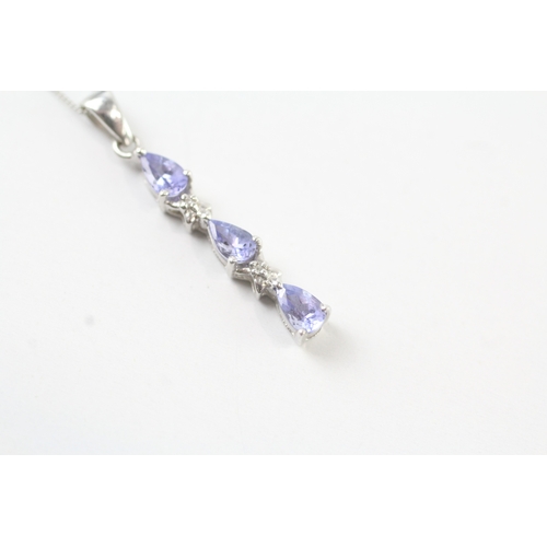 131 - 9ct white gold diamond and tanzanite set pendant necklace (1.7g)