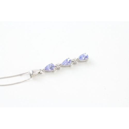 131 - 9ct white gold diamond and tanzanite set pendant necklace (1.7g)