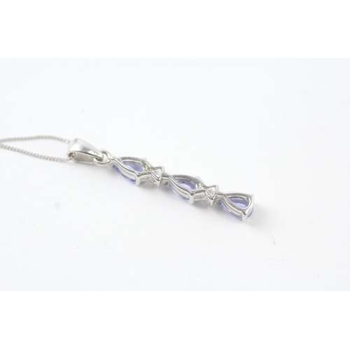 131 - 9ct white gold diamond and tanzanite set pendant necklace (1.7g)