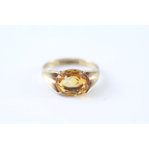 134 - 9ct gold citrine dress ring (2.8g) Size M