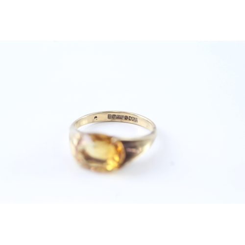 134 - 9ct gold citrine dress ring (2.8g) Size M