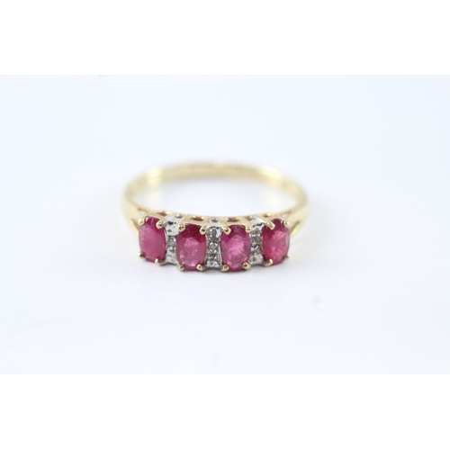 159 - 9ct gold ruby and diamond row ring (2.1g) Size Q