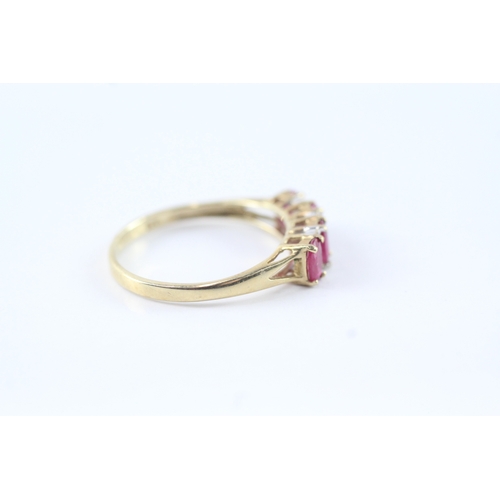 159 - 9ct gold ruby and diamond row ring (2.1g) Size Q