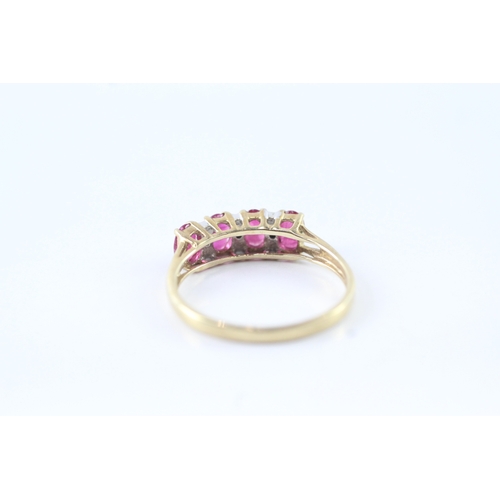 159 - 9ct gold ruby and diamond row ring (2.1g) Size Q