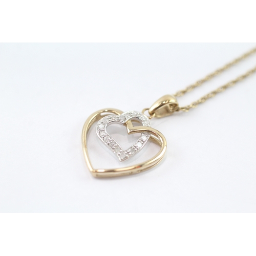 160 - 9ct gold diamond twin heart pendant necklace (2.7g)