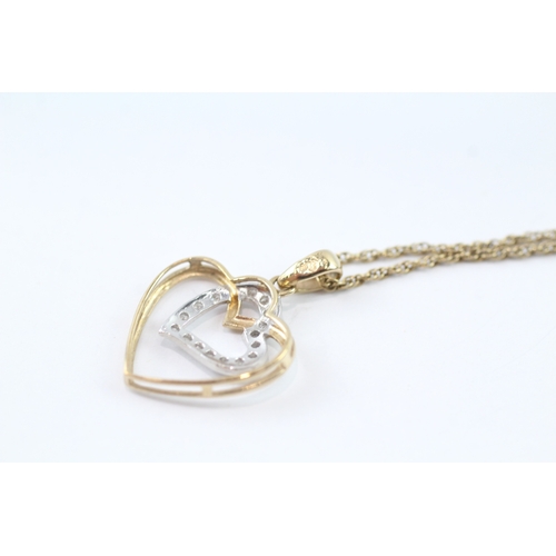 160 - 9ct gold diamond twin heart pendant necklace (2.7g)