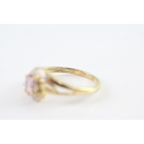 162 - 9ct gold diamond and amethyst twist ring (1.9g) Size P