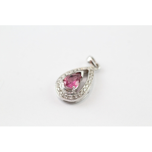 166 - 9ct white gold diamond and pear cut pink gemstone set pendant (2g)