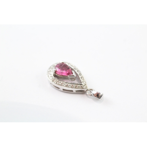 166 - 9ct white gold diamond and pear cut pink gemstone set pendant (2g)