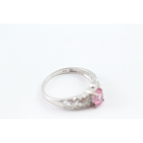 172 - 9ct white gold diamond and pink sapphire open work ring (2.3g) Size P