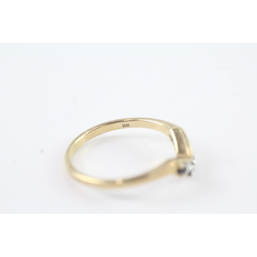 178 - 9ct gold diamond and sapphire wish bone ring (1.8g)