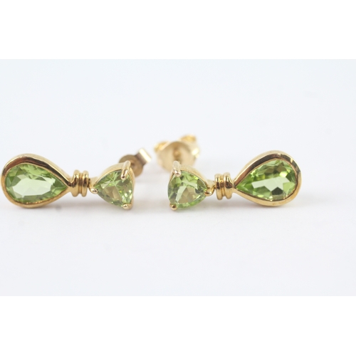 180 - 9ct gold vari-cut peridot drop earrings (2g)