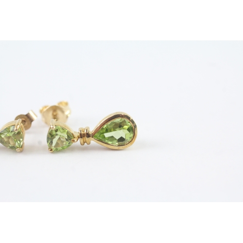 180 - 9ct gold vari-cut peridot drop earrings (2g)