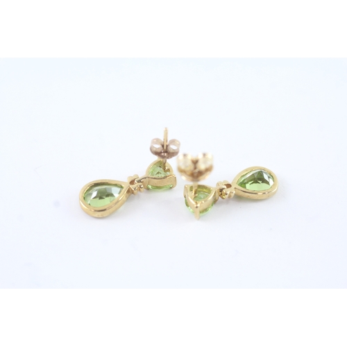 180 - 9ct gold vari-cut peridot drop earrings (2g)