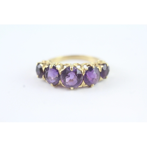 184 - 18ct gold amethyst five stone ring (5.8g)