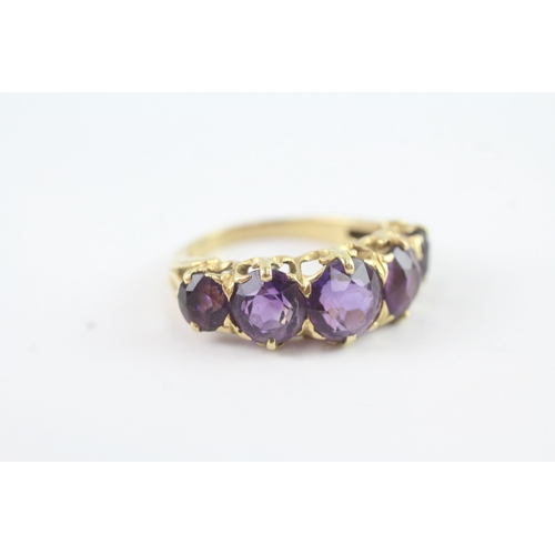 184 - 18ct gold amethyst five stone ring (5.8g)