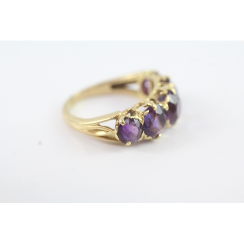 184 - 18ct gold amethyst five stone ring (5.8g)