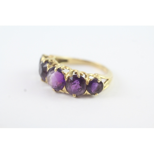 184 - 18ct gold amethyst five stone ring (5.8g)