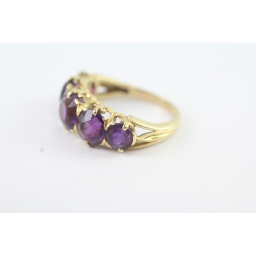 184 - 18ct gold amethyst five stone ring (5.8g)